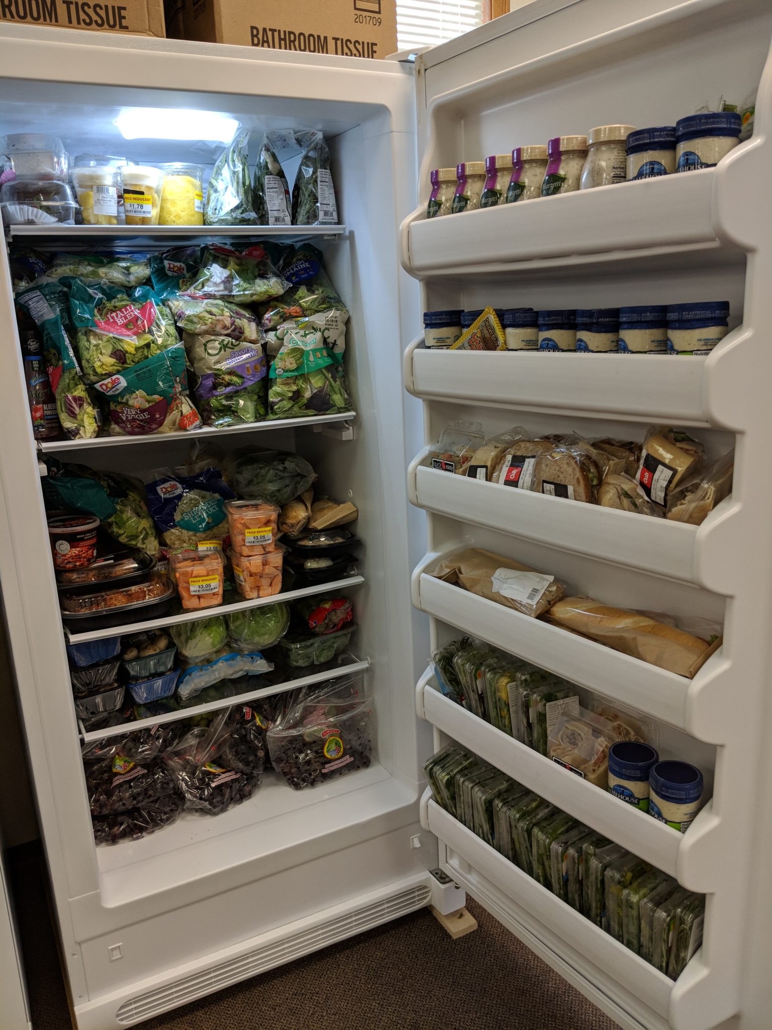 Refrigerator full of produce
